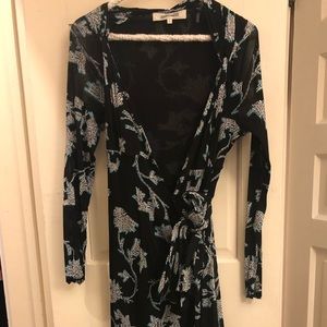 Diane Von Furstenberg tea-length wrap dress, sheer pattern